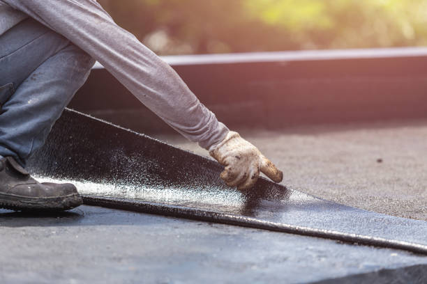 Professional Basement Waterproofing technician working in Randolph, AL